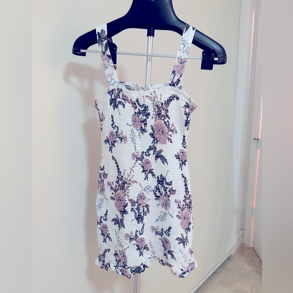 Perfect summer night our mini dress . Guess white with flowers